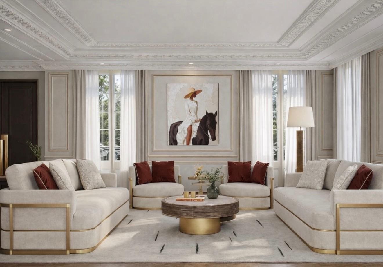 Drawing room with cream sofas edged in brass, tall windows with sheer curtains and a framed equestrian painting